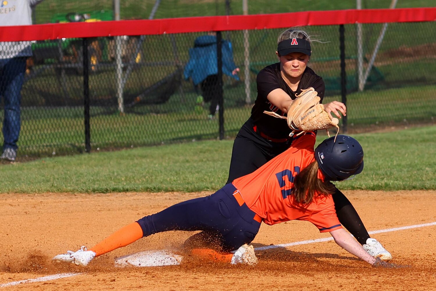 Jayla Birge of North Montgomery - stealing third base under the tag of Sadie Osborn of Attica