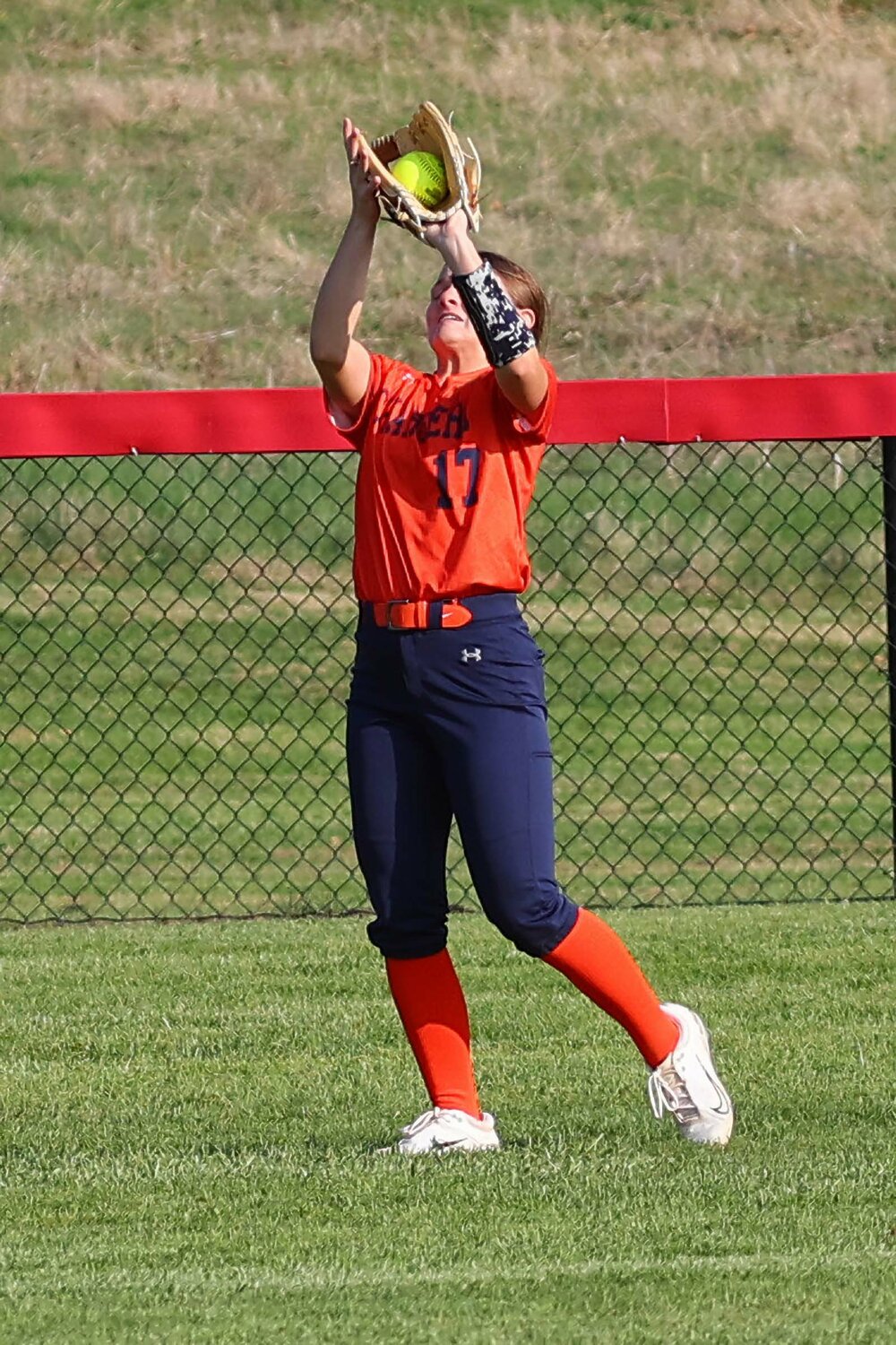 Sophie Welshimer of North Montgomery - catching a fly ball in centerfield