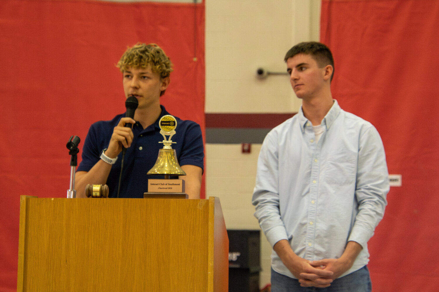 Senior club co-presidents Tyler Petroski and Vince Reimondo address the lunch crowd.