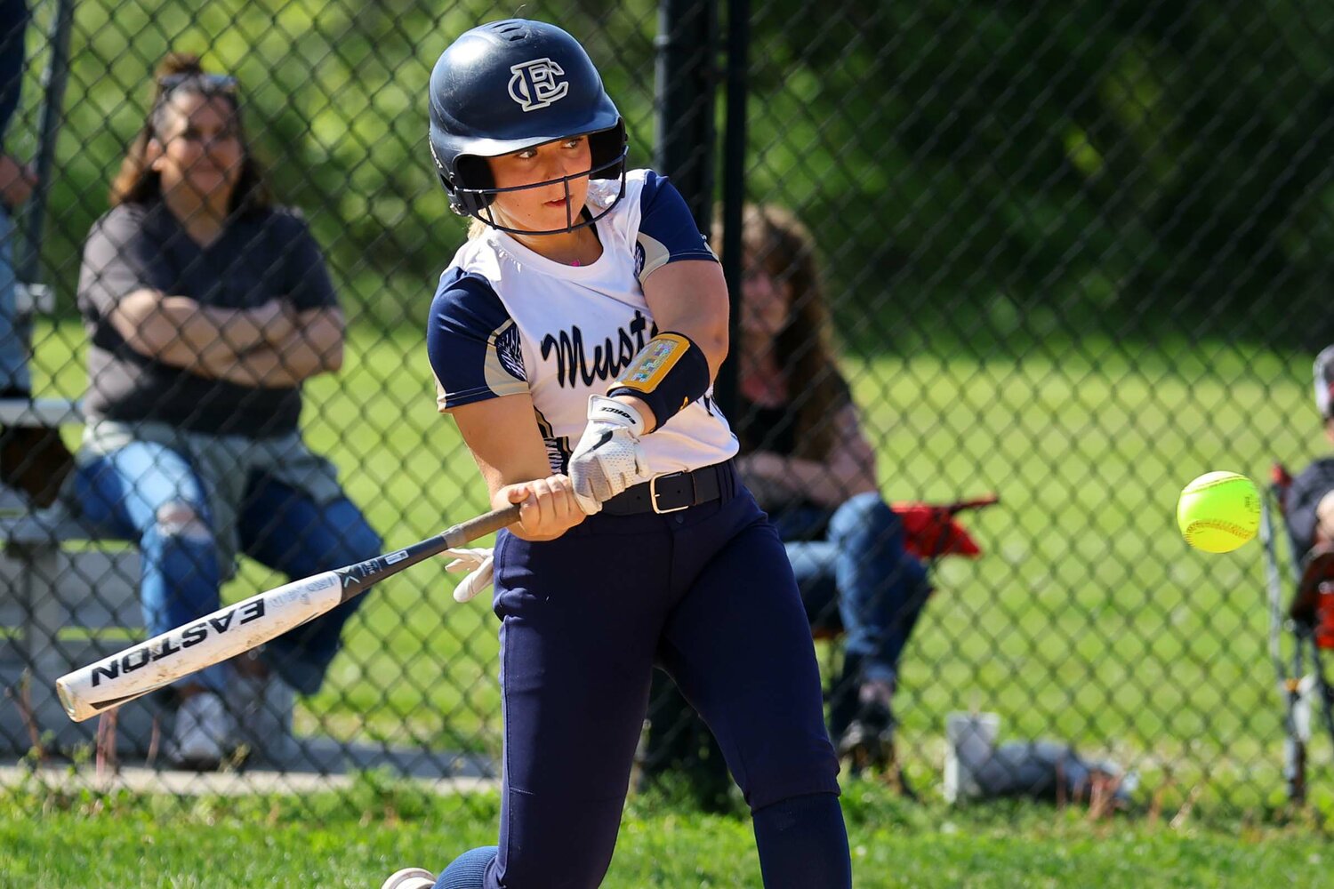 Mallory Massey of Fountain Central hits a home run over the centerfield fence.