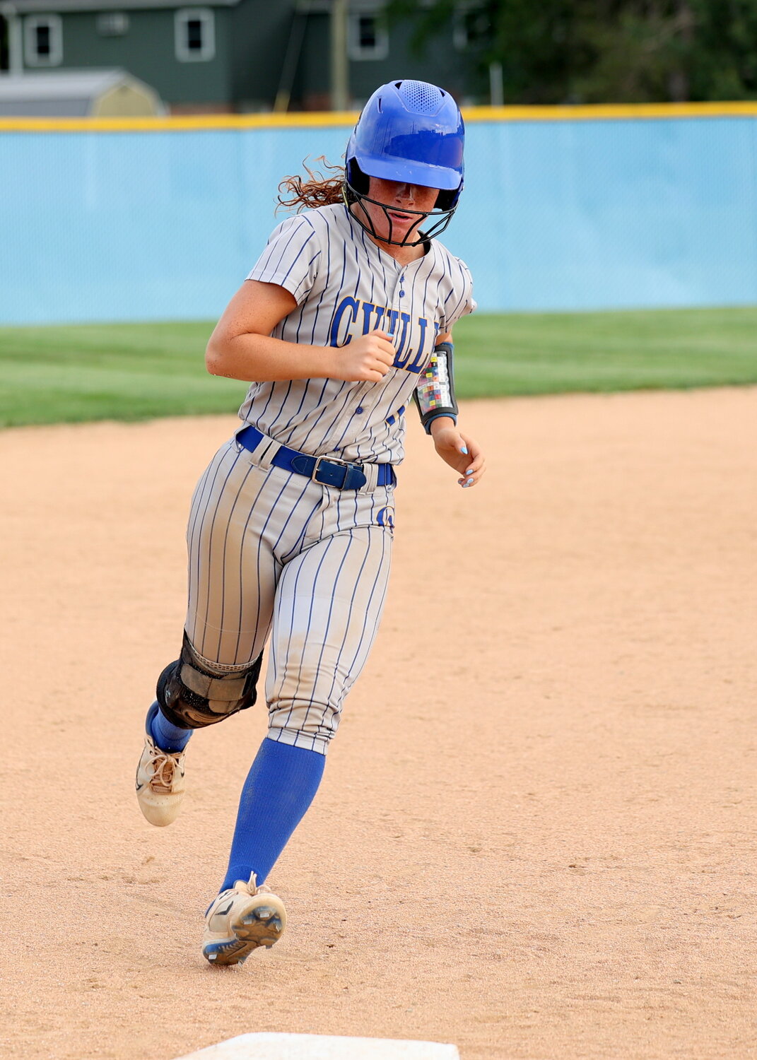 Celeste Moore rounds the base for Crawfordsville.