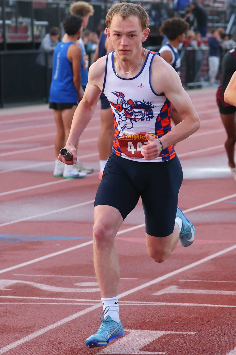 Camden Claycomb of North Montgomey - starting the anchor leg of the winning 4x400R.  He also advanced in the 200m.