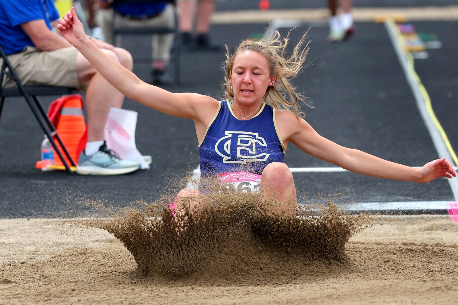 Brailey Hoagland of Fountain Central - long jump - landing FC school record jump of 17-05.25/5.31m for 13th place at the state meet