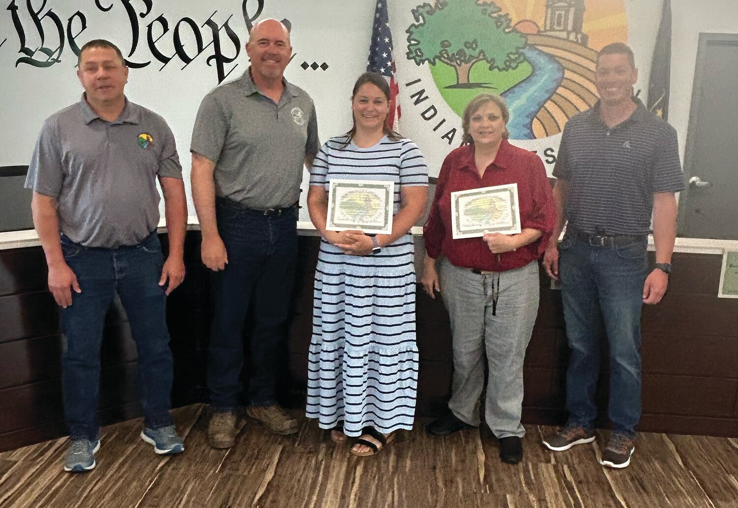 Pictured, from left, are Commissioners Jim Fulwider and Dan Guard; probation officers Lindsey Villalpando and Brenda Payne; and commissioner Jake Bohlander. County officials recognized the local probation officers who previously received an award from the United States Attorney’s Office.