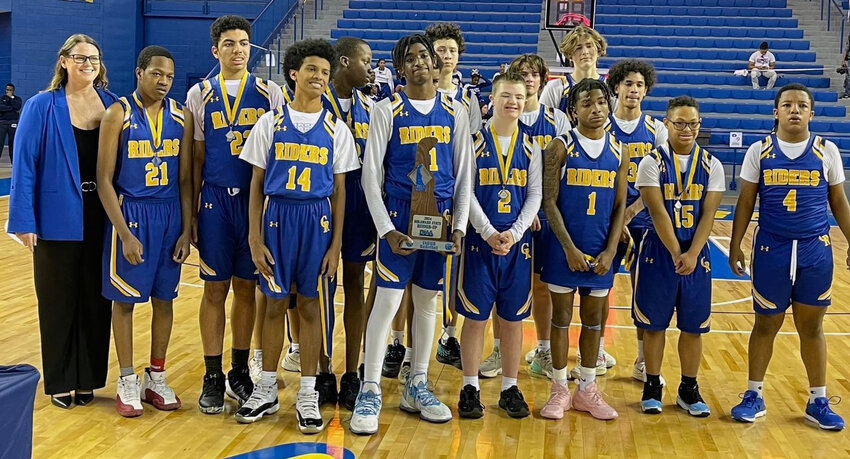 The Caesar Rodney High Unified basketball team poses with its second-place trophy on Saturday in the Carpenter Center. CAESAR RODNEY PHOTO.