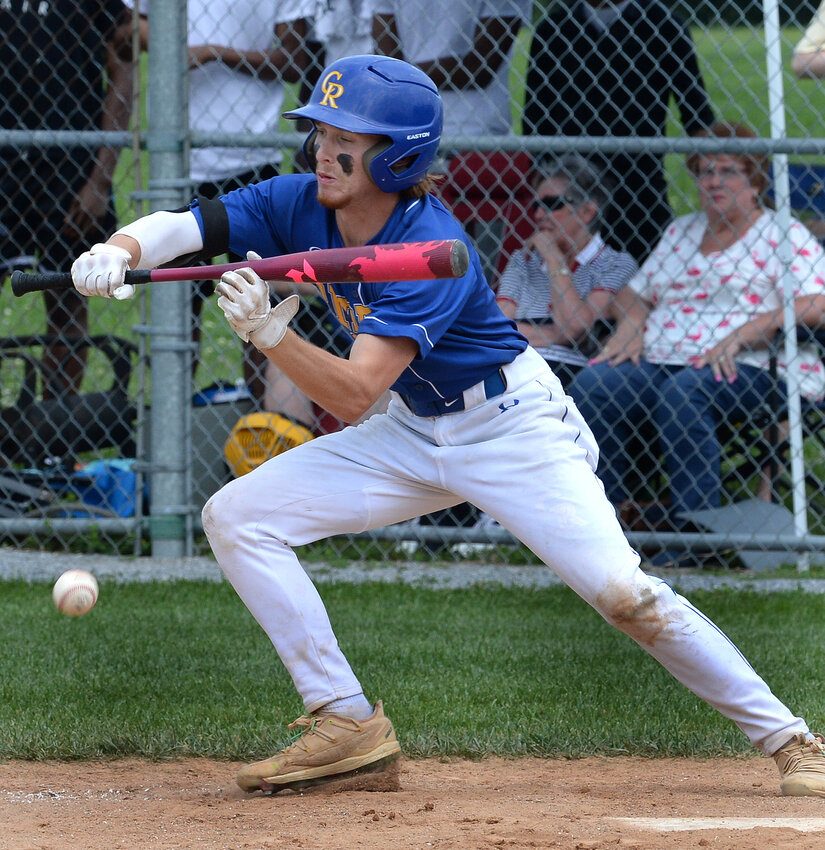 Graham Buckson of Caesar Rodney attempts to advance a runner on first base in the seventh inning of Saturday’s game with Dover.  SPECIAL TO THE DAILY STATE NEWS/GARY EMEIGH