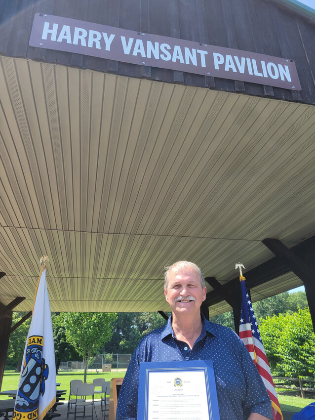 Harry VanSant stands at the pavilion in Camden's Brecknock County Park that was dedicated in his name Wednesday.