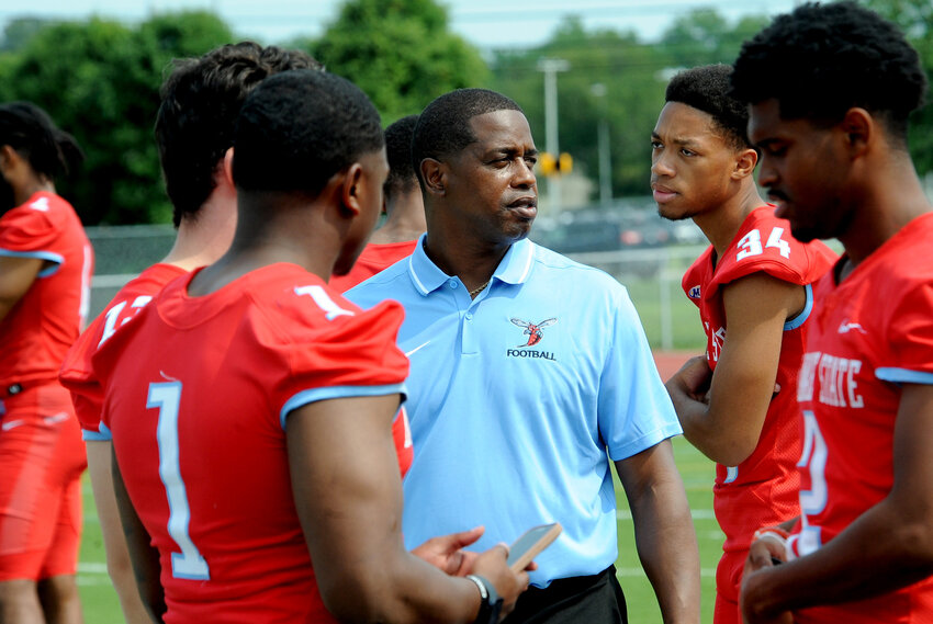Delaware State University head coach Lee Hull with some of his Hornets at Tuesday&rsquo;s media day.  GARY EMEIGH/SPECIAL TO THE DELAWARE STATE NEWS