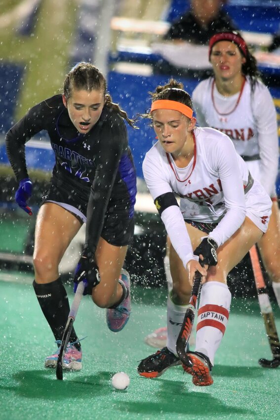 Smyrna&rsquo;s Dru Moffett gets the ball past a Wilmington Charter defender during the DIAA Field Hockey D1 semifinals, Tuesday, November 15, 2022 . Photo/Don Blake