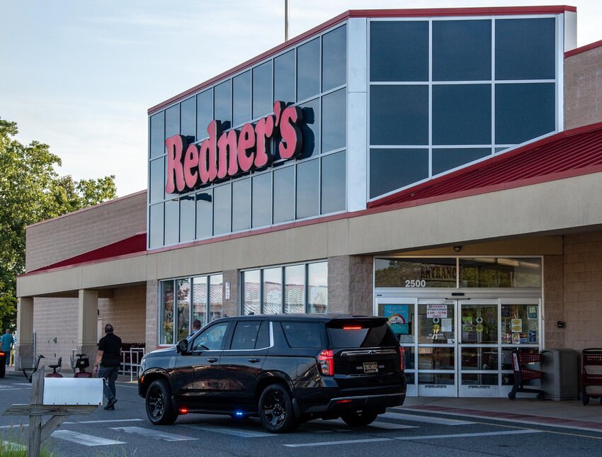 Police officers outside the Redner's grocery store in Camden Tuesday evening.
