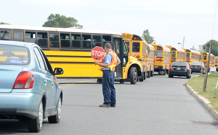 SchoolBuses-MClerySchool buses leave Caesar Rodney High School during a recent dismissal. Delaware State News/Marc Clery