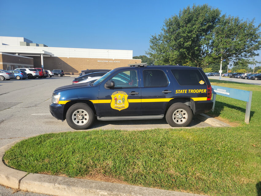 A Delaware State Police vehicle is parked outside Middletown High School on Wednesday, the second day of school.