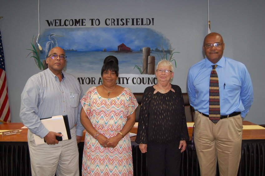 Crisfield's Director of Business Development A.C. Alrey with City Council members LaVerne Johnson, Ruthie Todd and Eric Banks.