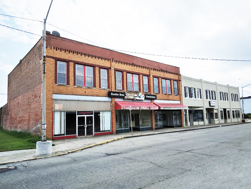 The former Gunter Bros. Hardware, on the left side of this row of city-owned buildings, is proposed to become a business incubator if federal revitalization funding is approved.