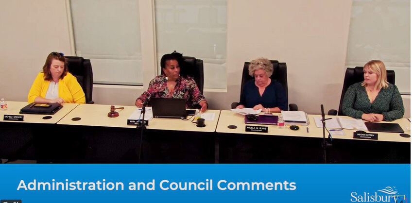Council President April Jackson, second from left, reads a statement at the Sept. 11 council session, saying the council asked questions as part of a closed meeting that could have been aired in public.