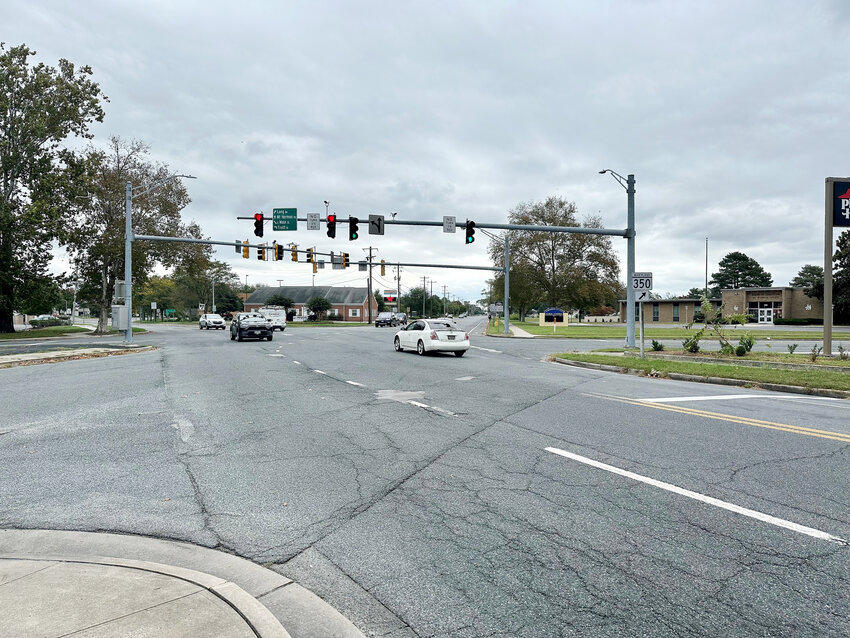 City and state officials will have to cooperate if a traffic circle is to be build at East Main Street and Mount Hermon Road.