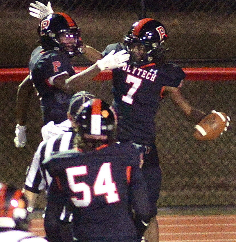 Polytech&rsquo;s Noah Walker celebrates with teammates after he put the Panthers on the board with a TD in the first quarter.  SPECIAL TO THE DELAWARE STATE NEWS/GARY EMEIGH