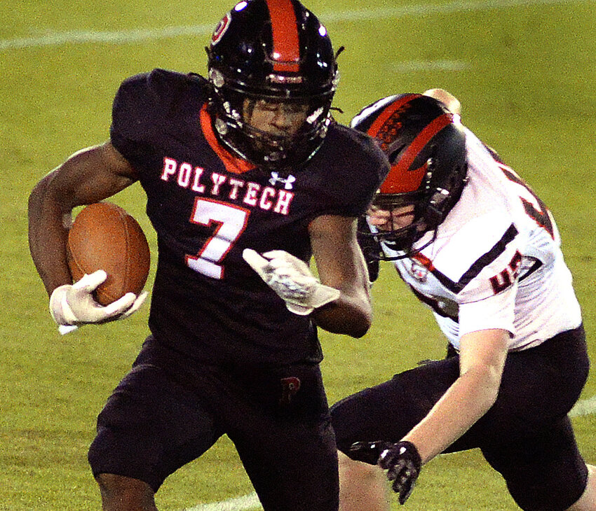 Polytech&rsquo;s Noah Walker carries for a short gain in the Friday night homecoming game against St. Andrews.  SPECIAL TO THE DELAWARE STATE NEWS/GARY EMEIGH