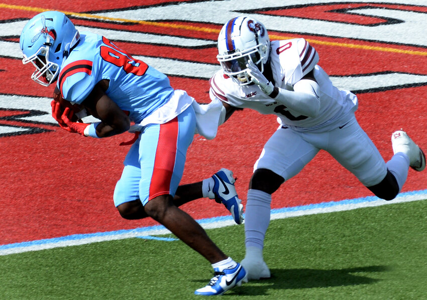 Delaware State wide receiver NyGhee Lolley put the Hornets on the board in the first quarter on a quick slant pass play against S. Carolina State.  SPECIAL TO THE DELAWARE STATE NEWS/GARY EMEIGH