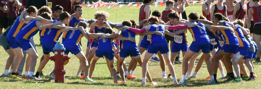 CR boys rally together before start of the Kent County cross-country championship Thursday at Polytech.  Special To The Delaware State News/Gary Emeigh