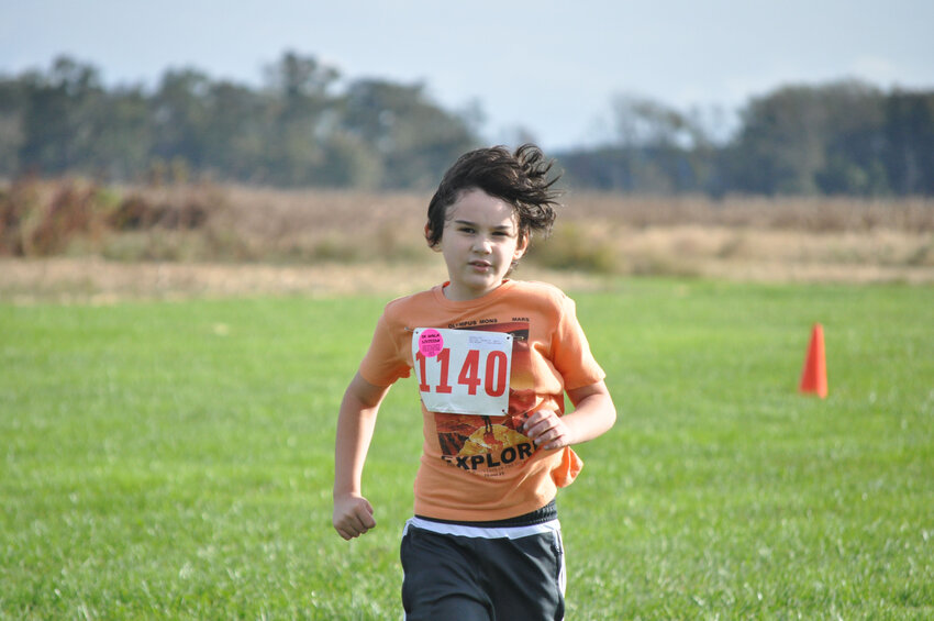 Liam Antonov of Frederick, Maryland runs in the 3rd annual Lace Up for Ag Literacy 5K benefiting the Delaware Farm Bureau Foundation.