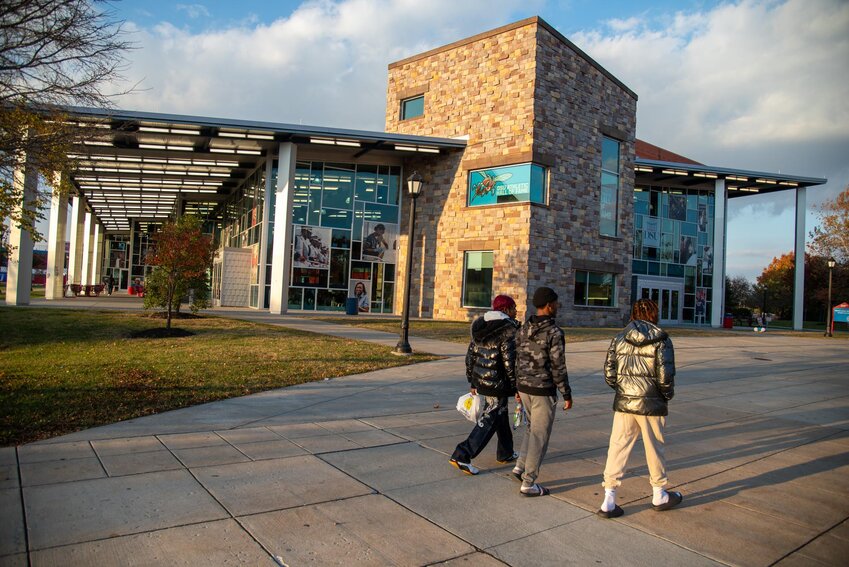 Students walk by the Martin Luther King, Jr. Student Center at Delaware State University on Nov. 11, 2023.