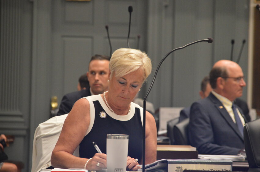 State Rep. Ruth Briggs King takes notes on the final day of session June 30. The Republican legislator announced her resignation Wednesday.