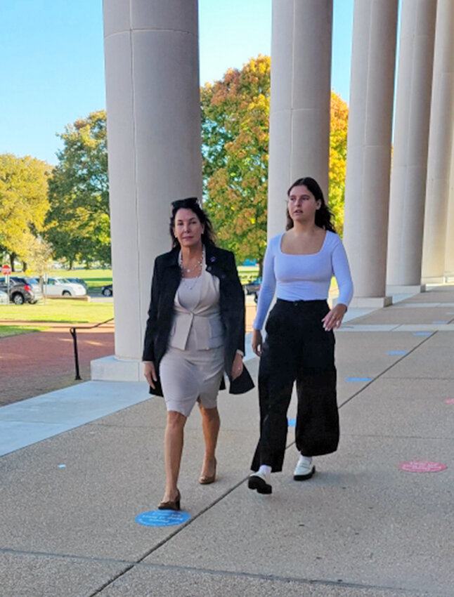 Former state Auditor Kathy McGuiness arrives at the Kent County Courthouse in October 2022 with her daughter, Saylar McGuiness. Ms. McGuiness is asking a Delaware Supreme Court judge to overturn her convictions of misdemeanor charges of conflict of interest, official misconduct and noncompliance with state procurement rules.