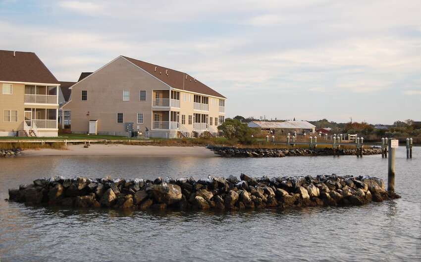 Stone sills, groins and vegetative buffers front Water's Edge condominiums but erosion continues to be an issue for which the homeowners are applying to the state for financial assistance to make more improvements.