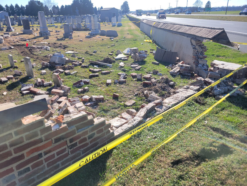 A vehicle traveling on Bay Road crashed into a brick wall at Barratt's Chapel Cemetery in Frederica on Wednesday.