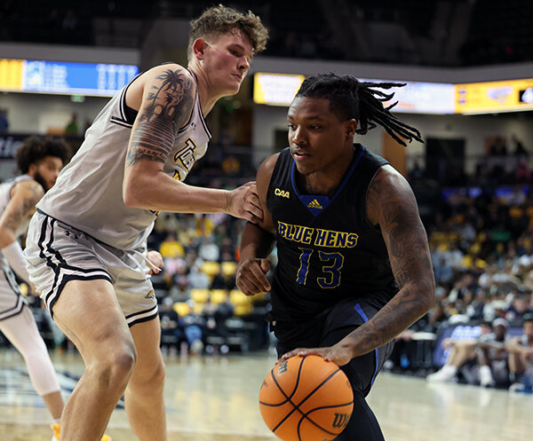 Delaware's Jyare Davis drives to the basket in Thursday night's CAA game at Towson. DELAWARE ATHLETICS PHOTO.