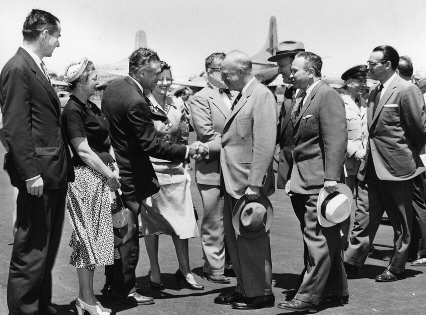 President Dwight Eisenhower is shown during a 1954 visit to Delaware. At left is  Governor J. Caleb Boggs.
