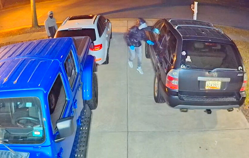 Cambridge police are investigating a series of vehicle thefts that occured overnight Feb. 27-28. At one home, a security camera caught images of two suspects checking car doors.