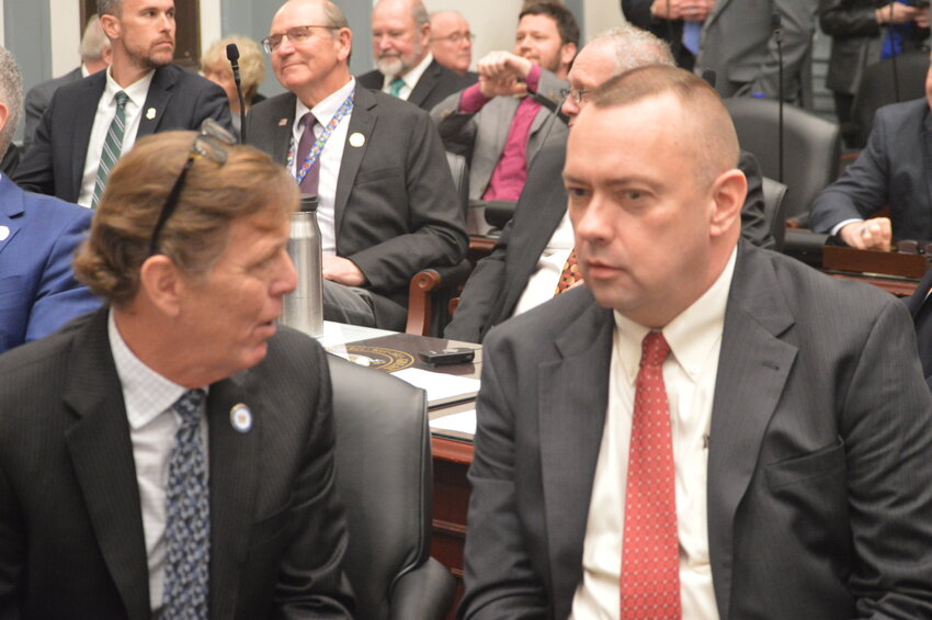 House Minority Leader Mike Ramone, left, and Senate Minority Whip Brian Pettyjohn have a discussion prior to Gov. John Carney's State of the State address Tuesday.