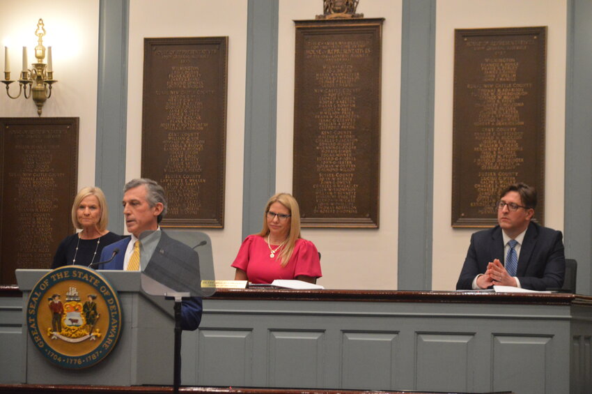 As Gov. Carney delivers his State of the State Address, Lt. Gov. Bethany Hall-Long (left), Speaker of the House Valerie Longhurst, D-Bear, (center) and Senate Majority Leader Bryan Townsend, D-Newark (right) watch on.