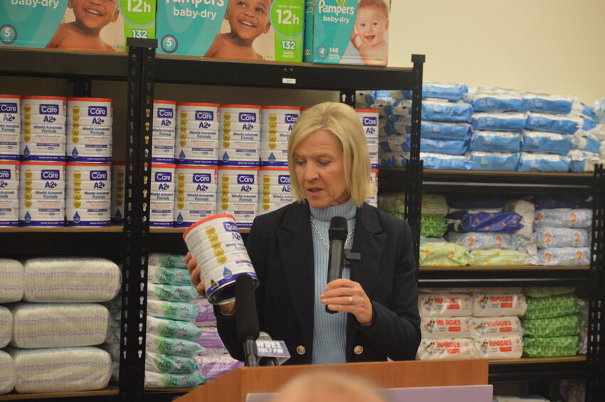 Lt. Gov. Hall-Long holds a 28.2-oz cannister of Care A2+ infant formula on Monday. The formula is what is distributed through the state program and is used due to its similarities with the widely-used brand Simalac.