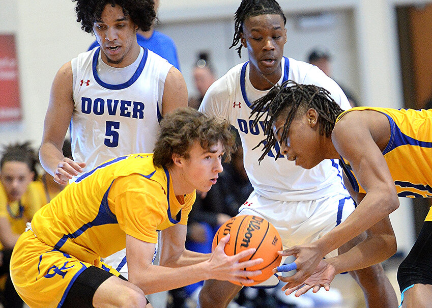 Caesar Rodney&rsquo;s Adam Bailey (left) and teammate Isaiah Alston pick up a loose ball in front of Dover&rsquo;s Noah Allen (5) and JayVion Denis. Baily, Alston and Allen are all playing in Saturday&rsquo;s Blue-Gold All-Star Game.  SPECIAL TO THE DELAWARE STATE NEWS/GARY EMEIGH