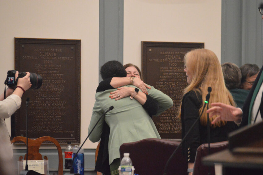 Senate Majority Whip Elizabeth &ldquo;Tizzy&rdquo; Lockman hugs Traci Manza Murphy, executive director of the Delaware Coalition Against Gun Violence, following the passage of permit-to-purchase legislation Thursday.