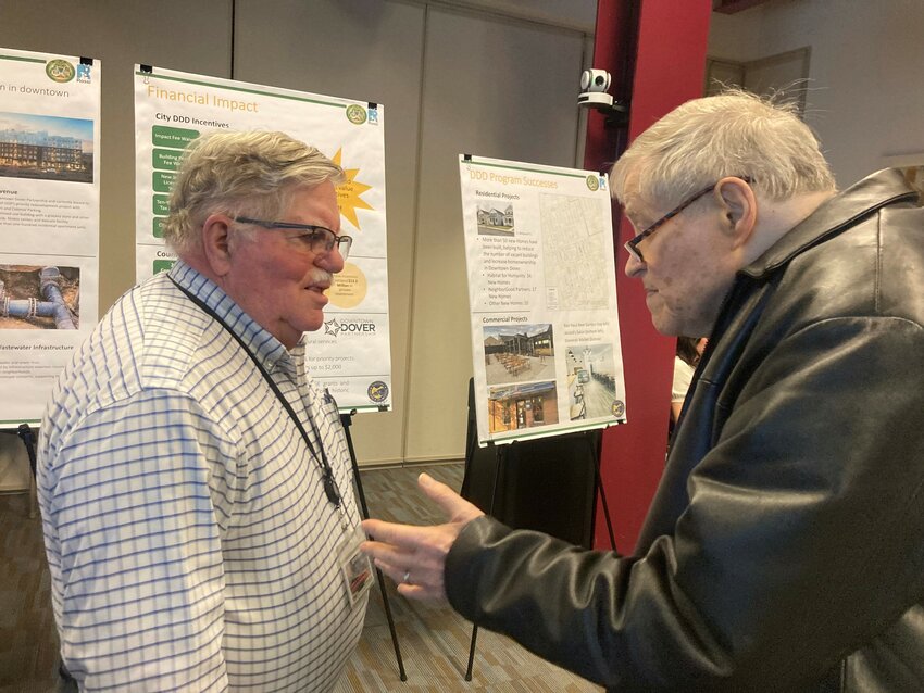 Dover City Manager Dave Hugg (left) discusses Dover&rsquo;s revitalization plan with Dover City Councilman Fred Neil Tuesday at the Dover Public Library.