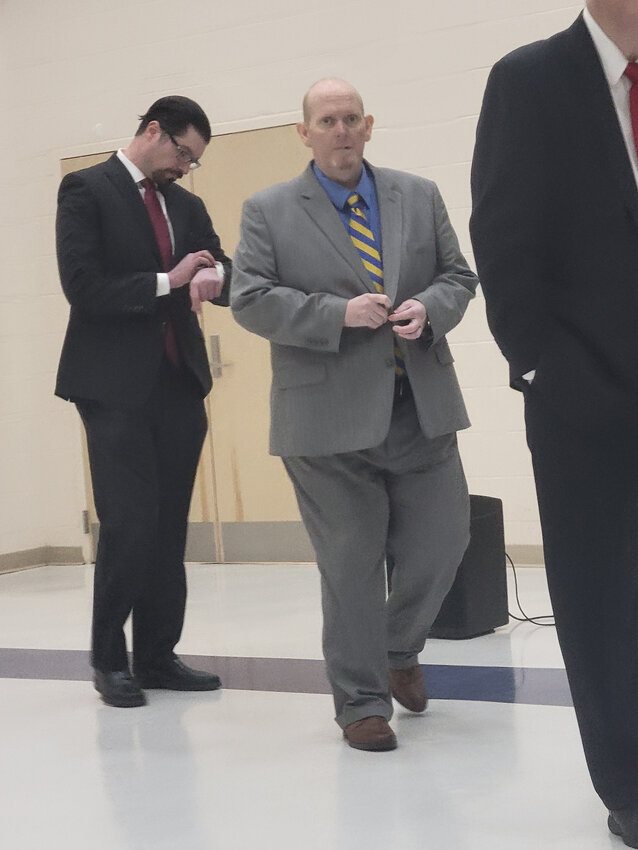 Attorney Stephen Neuberger, left, and former Sussex Central High principal Dr. Bradley Layfield are seen at an earlier termination hearing in Georgetown.