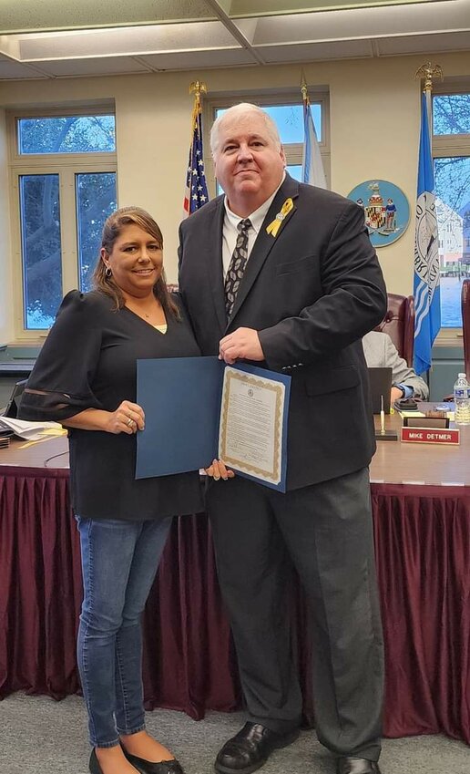 Shannon Hannawald, left.,of EndoWarriors of the Eastern Shore, accepted a proclamation from Dorchester County Council President George (Lenny) Pfeffer declaring March 2024 Endometriosis Awareness Month. (Debra Messick photo)