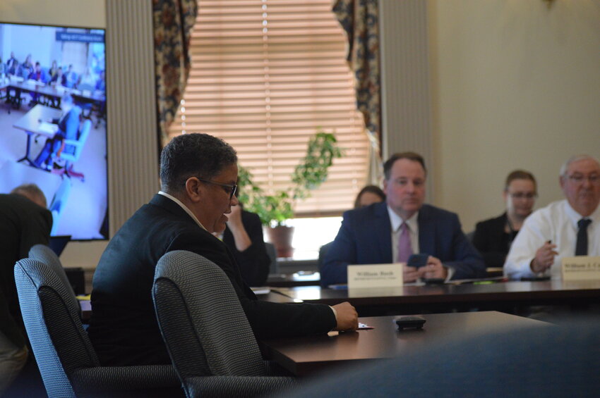 House Majority Whip Kerri Evelyn Harris, D-Dover, addresses members of the House Economic and Banking Committee on March 26 during consideration of a bill to put Delaware in line with federal Medicaid laws.