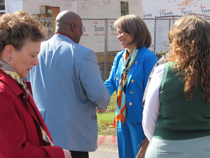 U.S. Rep. Lisa Blunt Rochester greets mayor of Harrington, Duane Bivens at the construction site of the Diamond Court Apartments.