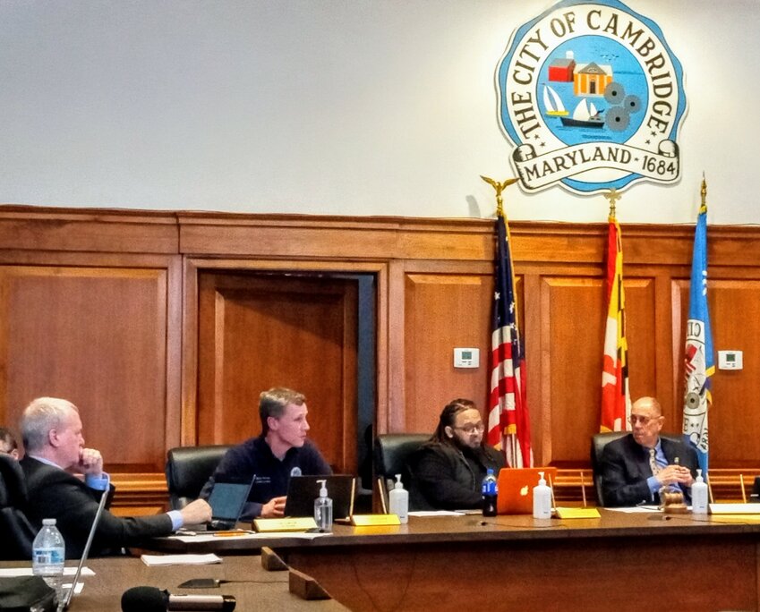 City officials listened as Council members weighed in on the decision to rezone the corner of High and Washington Streets Monday, April 8. From left, City Manager Tom Carroll, Ward Five Commissioner Brian Roche Ward Four Commissioner Sputty Cephas, Mayor Stephen Rideout.