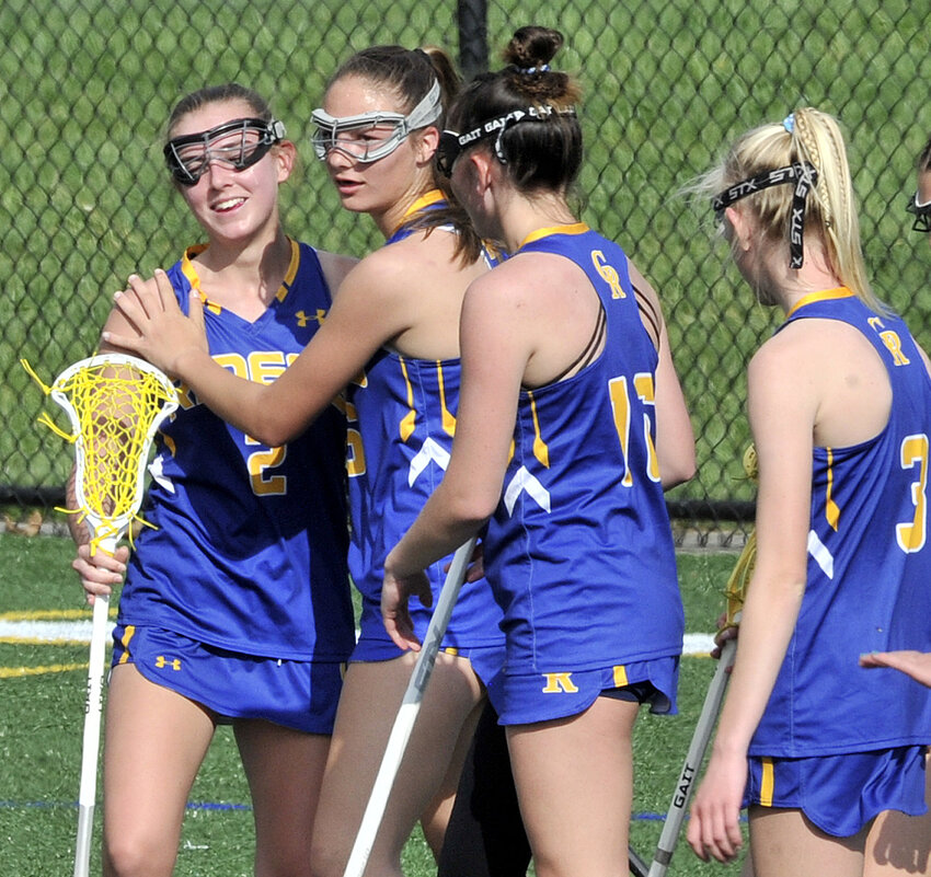 Isabella DiMondi (left) of Caesar Rodney celebrates with her teammates after she scored a goal late in the first half against Smyrna.  SPECIAL TO THE DAILY STATE NEWS/GARY EMEIGH