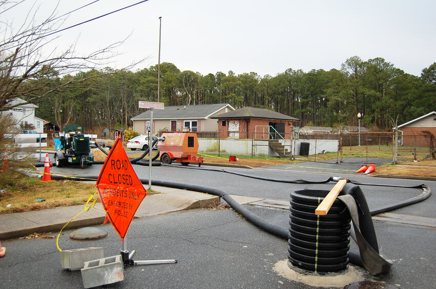 For most of this year Cove Street has not been thru-street at Second Street due to a catastrophic sewer pump breakdown at the lift station which was addressed through this system of auxiliary pumps and hoses. By this weekend the street is expected to be open again.