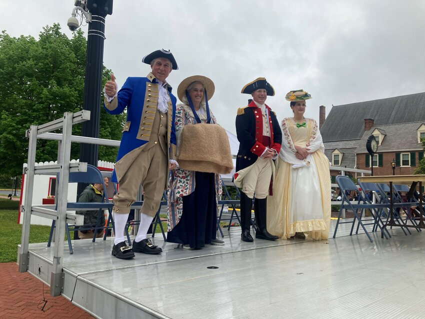 The 91st Dover Days Parade and Festival pressed on through scattered rain on Saturday afternoon as the day brought the city's history to life.