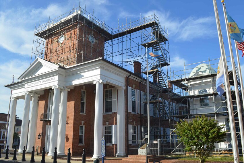 Scaffolding is up at Georgetown's Sussex County Courthouse for the restoration of its cupola, which has been removed and placed at ground level.