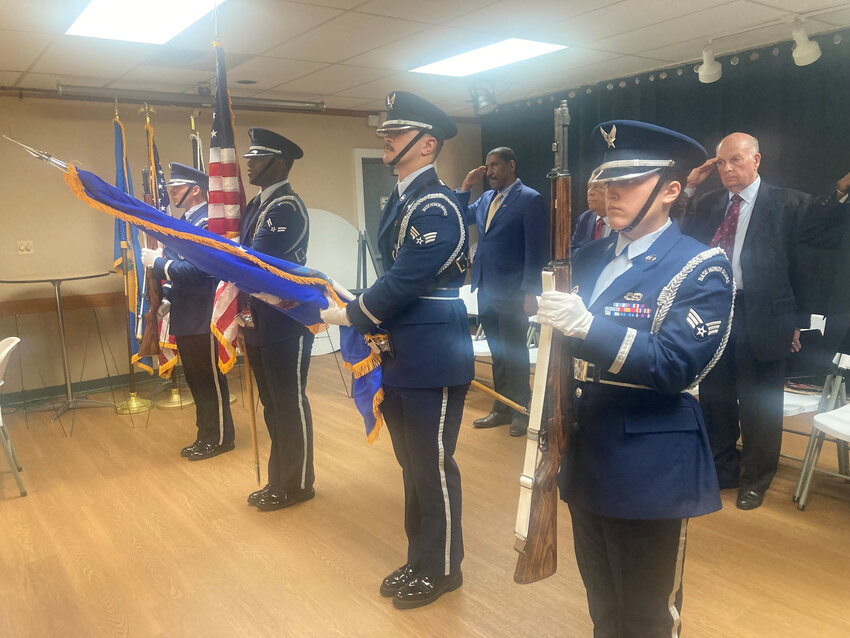 Members of the Dover Air Force Base honor guard present the colors at the beginning of a Memorial Day ceremony at Delaware Veterans Post 2 in Dover on Monday.