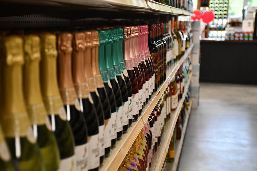 Empire Wine &amp; Spirits in Frederica held a ribbon cutting Friday to welcome the store to Asbury Square, right across from the DE Turf Sports Complex.